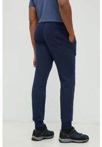 columbia - Columbia spodnie dresowe męskie kolor granatowy gładkie. Kolor: niebieski. Materiał: dresówka. Wzór: gładki #4