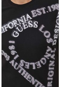 Guess t-shirt bawełniany kolor czarny z nadrukiem. Kolor: czarny. Materiał: bawełna. Długość rękawa: krótki rękaw. Długość: krótkie. Wzór: nadruk. Styl: klasyczny #4
