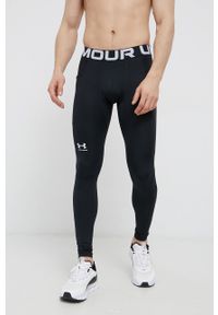 Under Armour legginsy treningowe kolor czarny gładkie. Kolor: czarny. Materiał: skóra, materiał. Wzór: gładki #1