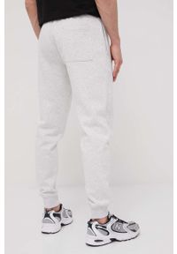 Tommy Jeans Spodnie DM0DM11163.PPYY męskie kolor szary gładkie. Kolor: szary. Materiał: bawełna, dzianina. Wzór: gładki #3