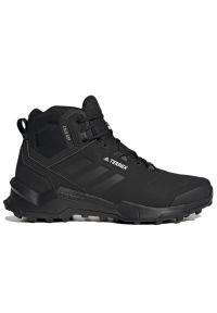 Adidas - Buty adidas Terrex AX4 Mid Beta Cold.Rdy Hiking Boots GX8652 - czarne. Zapięcie: pasek. Kolor: czarny. Materiał: polar, syntetyk, materiał, guma. Szerokość cholewki: normalna. Technologia: Primaloft. Wzór: aplikacja, paski. Model: Adidas Terrex. Sport: turystyka piesza