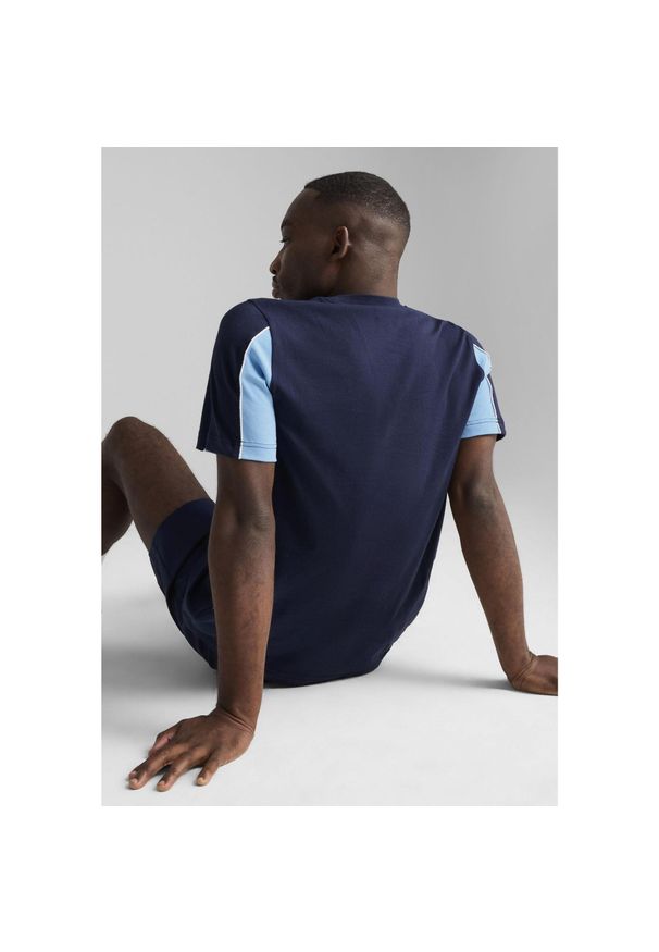 Puma - Męska koszulka Manchester City ftblARCHIVE PUMA Navy Team Light Blue. Kolor: niebieski. Materiał: guma. Wzór: nadruk