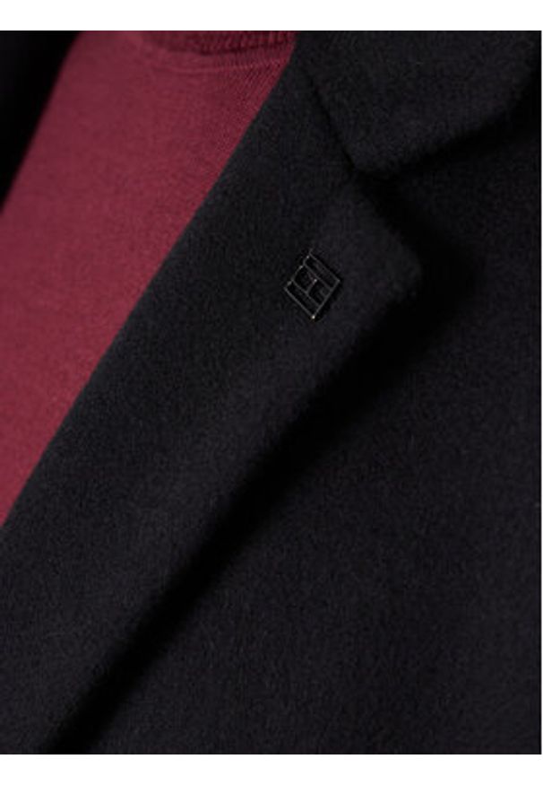 TOMMY HILFIGER - Tommy Hilfiger Płaszcz wełniany MW0MW40768 Czarny Regular Fit. Kolor: czarny. Materiał: wełna