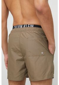 Calvin Klein szorty kąpielowe kolor brązowy. Kolor: brązowy. Materiał: tkanina, poliester, materiał. Wzór: nadruk #4