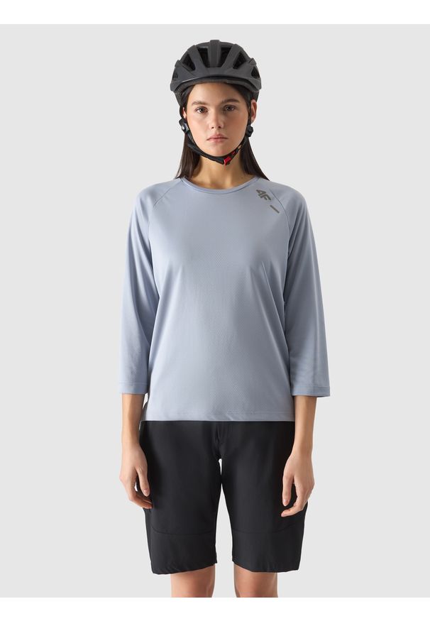 4f - Longsleeve rowerowy szybkoschnący damski - niebieski. Kolor: niebieski. Materiał: materiał, włókno, dzianina, skóra, syntetyk. Długość rękawa: długi rękaw. Długość: krótkie, długie. Wzór: gładki, ze splotem. Sport: kolarstwo