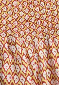 Renee - Żółto-Pomarańczowe Szerokie Spodnie z Wiskozy z Marszczoną Gumką w Talii Mellody. Kolor: żółty. Materiał: wiskoza. Styl: boho #2