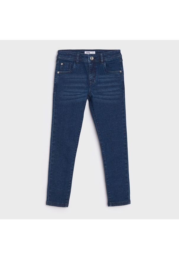 Sinsay - Spodnie jeansowe slim - Granatowy. Kolor: niebieski