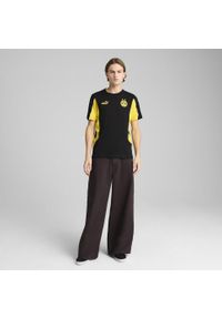 Puma - Męska koszulka Borussia Dortmund ftblARCHIVE PUMA Black Faster Yellow. Kolor: czarny, żółty, wielokolorowy. Wzór: aplikacja