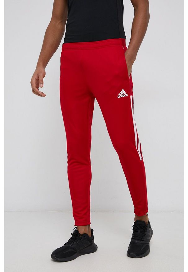 adidas Performance spodnie treningowe GJ9869 męskie kolor czerwony gładkie. Kolor: czerwony. Materiał: poliester, skóra, materiał. Wzór: gładki. Sport: fitness