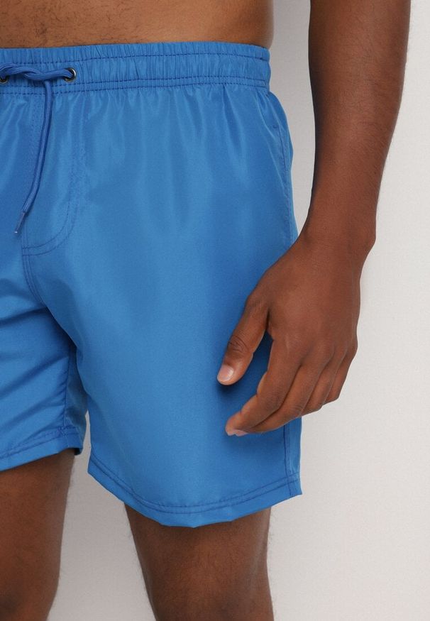 Born2be - Niebieskie Klasyczne Kąpielówki Typu Szorty z Kieszeniami Aravie. Kolor: niebieski. Materiał: len