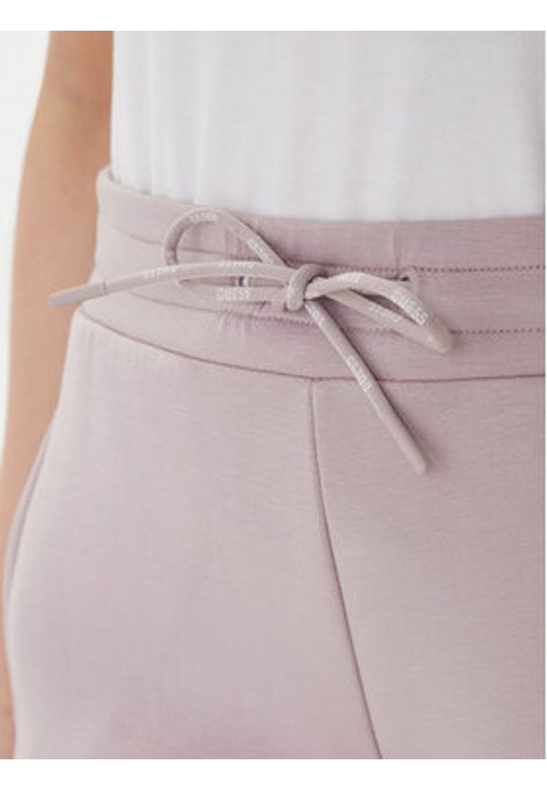 Guess Spodnie dresowe Allie Scuba V2YB18 K7UW2 Beżowy Regular Fit. Kolor: beżowy. Materiał: syntetyk