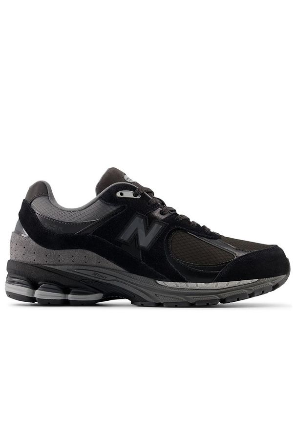Buty unisex New Balance U2002RTG - czarne. Kolor: czarny. Materiał: zamsz, guma. Szerokość cholewki: normalna