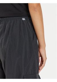 New Balance Spodnie dresowe WP43534 Czarny Relaxed Fit. Kolor: czarny. Materiał: syntetyk #3
