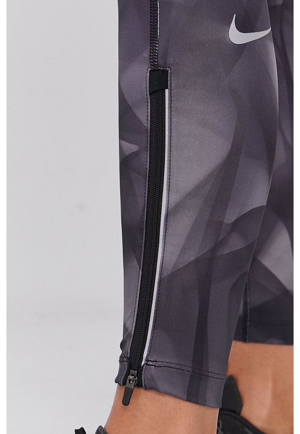 Nike - Legginsy. Kolor: szary. Materiał: dzianina, materiał, tkanina, włókno, skóra. Technologia: Dri-Fit (Nike)