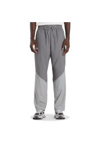 Spodnie męskie New Balance MB61R010CAS - szare. Kolor: szary. Materiał: materiał, poliester #1