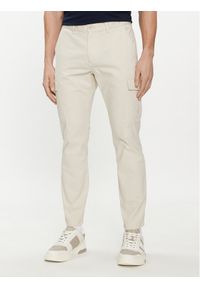 Tommy Jeans Spodnie materiałowe Austin DM0DM18940 Beżowy Slim Fit. Kolor: beżowy. Materiał: bawełna