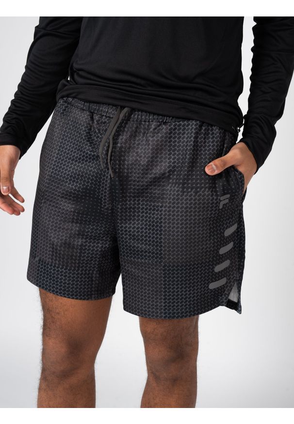 Fila Szorty "Training-Rodeneck" | FAM0289 | Mężczyzna | Czarny. Okazja: na co dzień. Kolor: czarny. Materiał: poliester, elastan. Wzór: nadruk. Styl: casual
