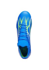 Buty piłkarskie Puma Ultra Match FG/AG M 107347 03 niebieskie. Kolor: niebieski. Szerokość cholewki: normalna. Sport: piłka nożna