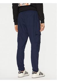 Adidas - adidas Spodnie dresowe Trefoil Essentials Woven Cargo JD2454 Granatowy Regular Fit. Kolor: niebieski. Materiał: syntetyk #2