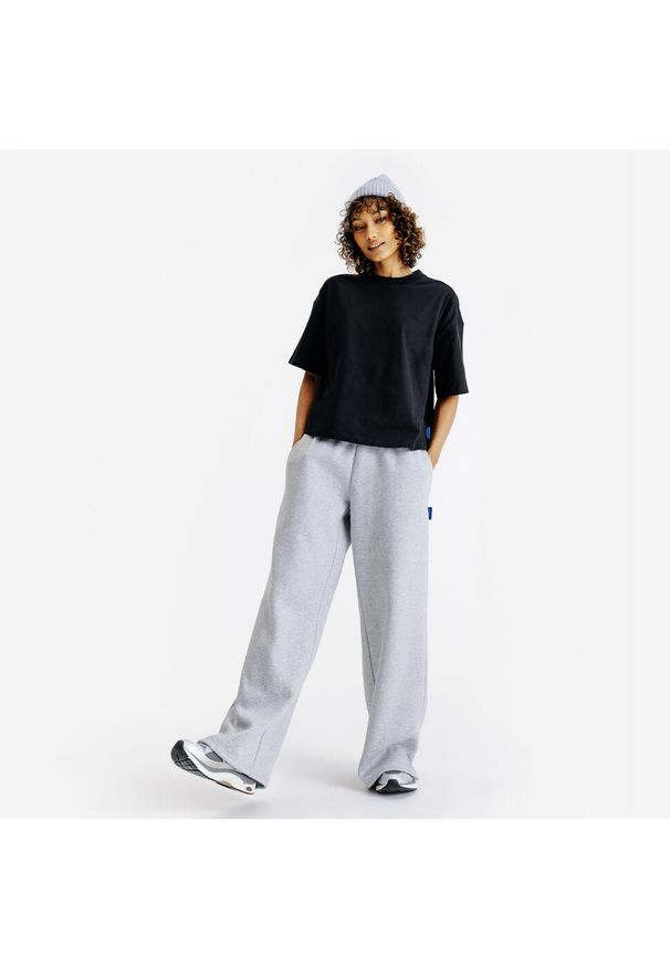Decathlon - Koszulka Crop damska. Kolor: czarny. Materiał: materiał, elastan, bawełna. Długość: krótkie