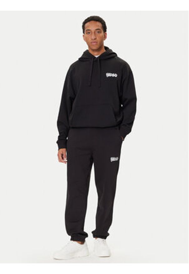 Hugo - HUGO Spodnie dresowe Nyrotro 50549779 Czarny Loose Fit. Kolor: czarny. Materiał: bawełna
