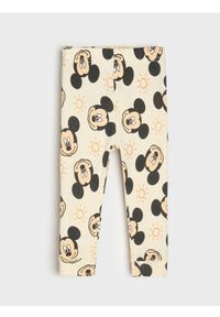 Sinsay - Bawełniane legginsy ze wzorem Mickey Mouse - kremowy. Kolor: kremowy. Materiał: bawełna. Wzór: motyw z bajki #1