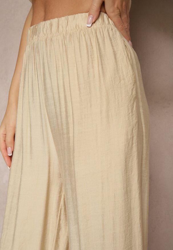 Renee - Beżowe Spodnie Palazzo o Szerokim Kroju High Waist Lislevia. Okazja: na co dzień. Stan: podwyższony. Kolor: beżowy. Styl: elegancki, casual