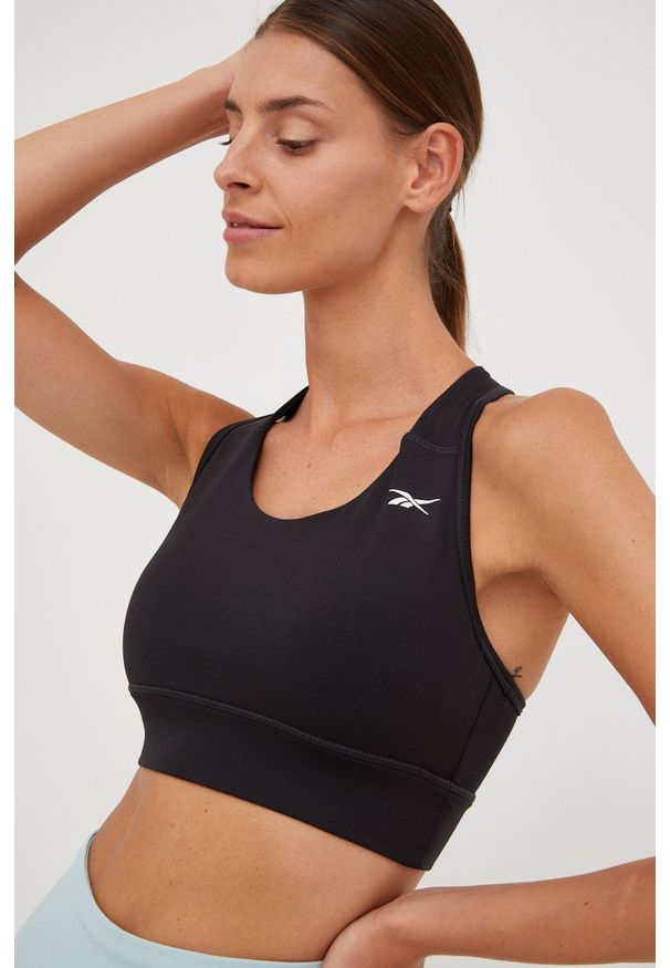 Reebok biustonosz sportowy Running Essentials kolor czarny gładki. Kolor: czarny. Materiał: poliester, skóra, dzianina, materiał. Wzór: gładki. Sport: bieganie