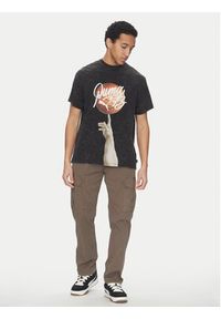 Puma T-Shirt Dylan Exhibit 630475 Czarny Regular Fit. Kolor: czarny. Materiał: bawełna