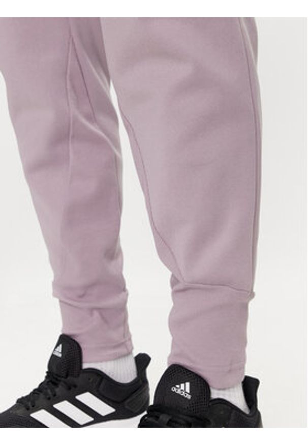Adidas - adidas Spodnie dresowe Z.N.E. Winterized IR5245 Fioletowy Regular Fit. Kolor: fioletowy. Materiał: syntetyk