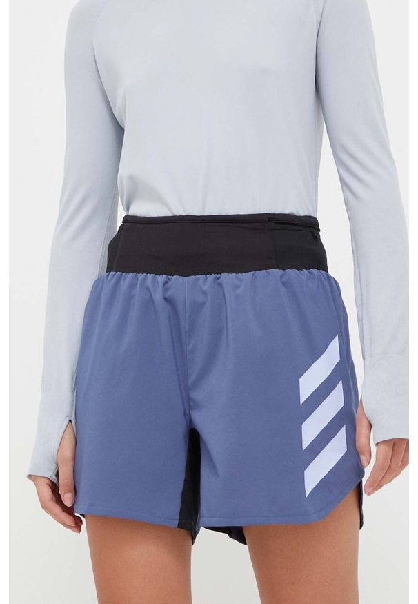 adidas TERREX szorty sportowe Agravic damskie kolor niebieski z nadrukiem high waist. Stan: podwyższony. Kolor: niebieski. Materiał: tkanina, skóra, materiał. Wzór: nadruk. Styl: sportowy