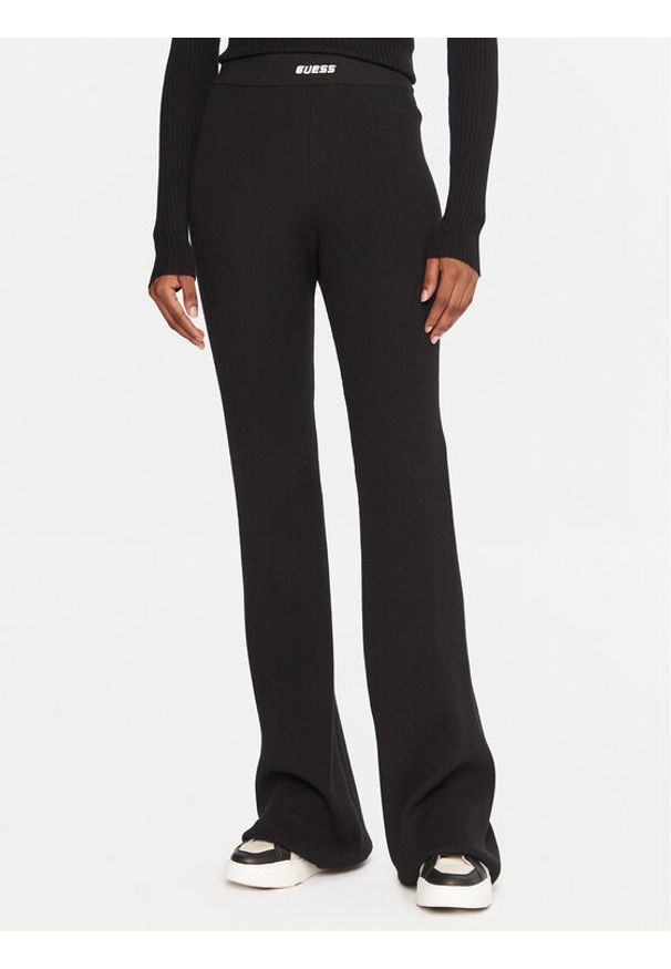 Guess Legginsy V5BB08 Z3JD2 Czarny Flare Fit. Kolor: czarny. Materiał: syntetyk