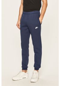 Nike Sportswear - Spodnie. Kolor: niebieski. Materiał: dzianina. Wzór: gładki #1