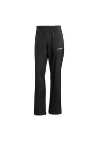 Adidas - Dwuwarstwowe spodnie przeciwdeszczowe Terrex Multi Climaproof 2.0. Kolor: czarny. Technologia: ClimaProof (Adidas). Sport: turystyka piesza