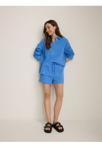 Reserved - Szorty z bawełnianego muślinu - jasnoniebieski. Kolor: niebieski. Materiał: bawełna