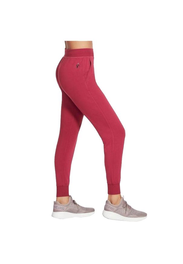 skechers - Spodnie sportowe damskie Skechers Restful Jogger Pant. Kolor: różowy. Materiał: elastan, poliester. Długość: długie