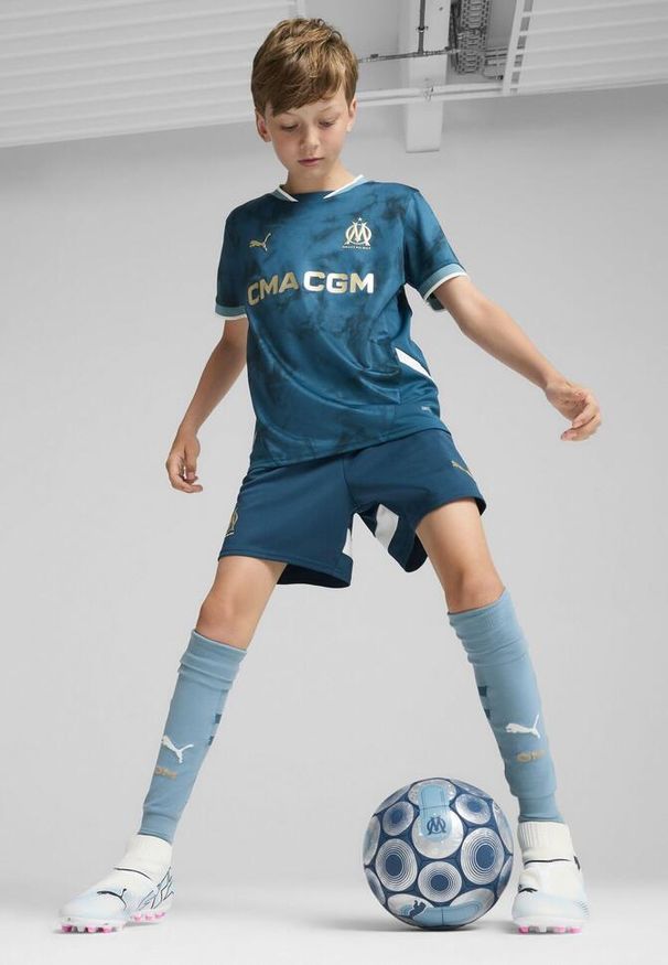 Puma - Młodzieżowe szorty Olympique Marsylia 24/25 PUMA Ocean Tropic Bold Blue. Kolor: niebieski. Sport: piłka nożna