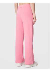Femi Stories Spodnie dresowe Flare Różowy Relaxed Fit. Kolor: różowy. Materiał: bawełna