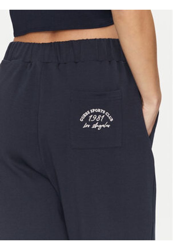 Guess Spodnie dresowe V5GB03 KCS01 Granatowy Regular Fit. Kolor: niebieski. Materiał: bawełna