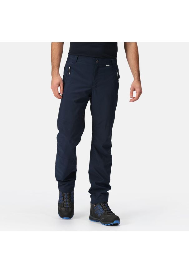 Regatta - Męskie spodnie trekkingowe wodoodporne Dayhike IV. Kolor: niebieski. Sezon: lato. Sport: turystyka piesza