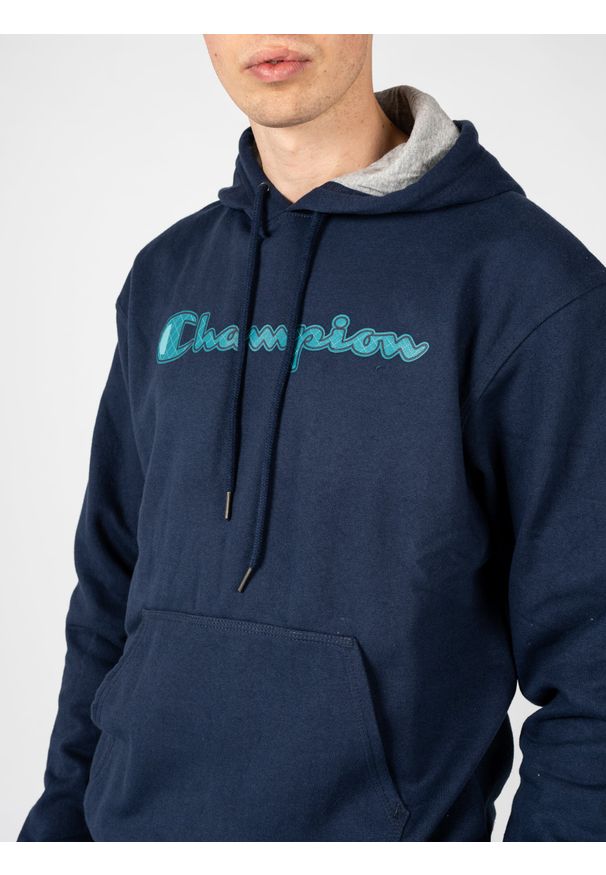 Champion Bluza "Hoodie" | HBGF89H586N9A | Mężczyzna | Granatowy. Okazja: na co dzień. Typ kołnierza: kaptur. Kolor: niebieski. Materiał: poliester, bawełna. Wzór: aplikacja. Styl: casual