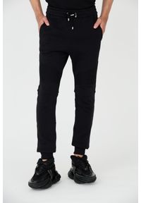 Balmain - BALMAIN Czarne męskie spodnie dresowe Ribbed Flock Sweatpants, Rozmiar L. Kolor: czarny. Materiał: dresówka
