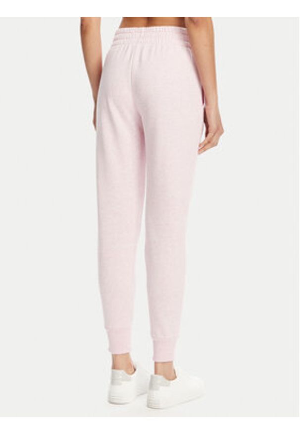 Under Armour Spodnie dresowe Ua Rival Fleece Jogger 1379438 Różowy Loose Fit. Kolor: różowy. Materiał: bawełna