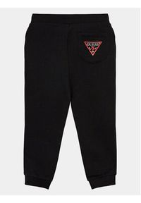 Guess Spodnie dresowe N93Q17 KAUG0 Czarny Regular Fit. Kolor: czarny. Materiał: bawełna #3
