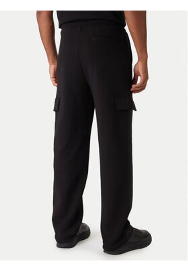Hugo - HUGO Spodnie dresowe Danovopan 50546376 Czarny Relaxed Fit. Kolor: czarny. Materiał: bawełna