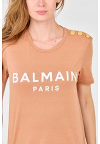 Balmain - BALMAIN Brązowy damski t-shirt z guzikami. Kolor: brązowy. Materiał: bawełna