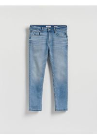 Reserved - Jeansy slim z efektem sprania - niebieski. Kolor: niebieski #1