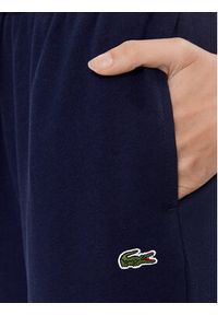 Lacoste Spodnie dresowe XF9216 Granatowy Regular Fit. Kolor: niebieski. Materiał: bawełna