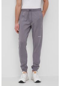Calvin Klein Jeans Spodnie bawełniane męskie kolor szary gładkie. Kolor: szary. Materiał: bawełna. Wzór: gładki #1