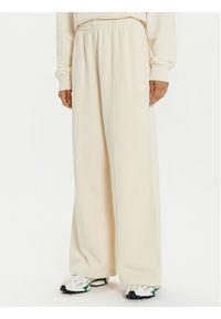 Lacoste Spodnie dresowe XF2657 Écru Wide Leg. Materiał: bawełna #1